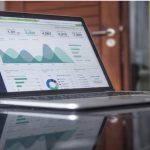 Data displayed on laptop screen demonstrating self service BI strategy